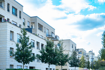 Obraz premium Contemporary residential buildings, community with lush greenery, modern architecture and well-maintained landscape, New apartment buildings