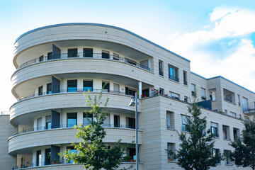 Contemporary residential buildings, community with lush greenery, modern architecture and well-maintained landscape, New apartment buildings