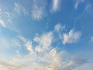 gentle white clouds in the blue sky