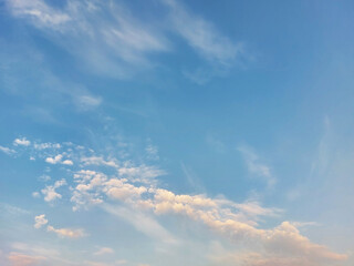 gentle white clouds in the blue sky