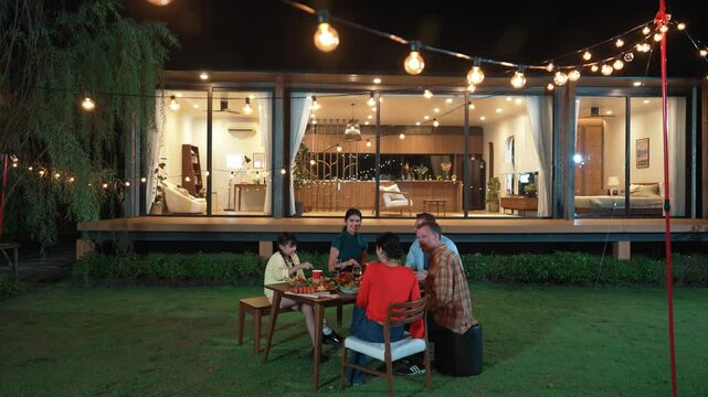Family together for holiday celebration in garden. Family member gather have dinner. Outdoor picnic activity to relax with food and spend time with cute relatives cross generation gap. Divergence.
