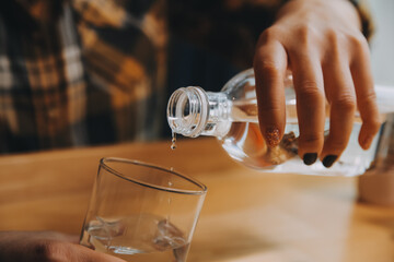 healthy beautiful young woman holding glass of water