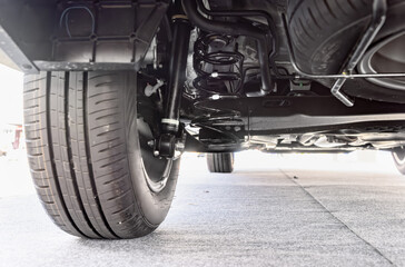 MPV hyvrid car suspension and rear drive shaft.