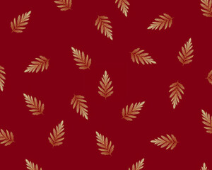 Christmas wallpaper with a red background and golden pine needles.