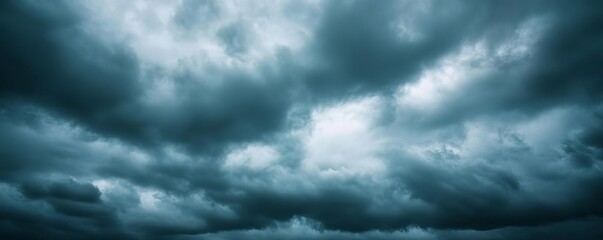 Overcast sky with dark clouds threatening rain, gloomy weather, moody atmosphere