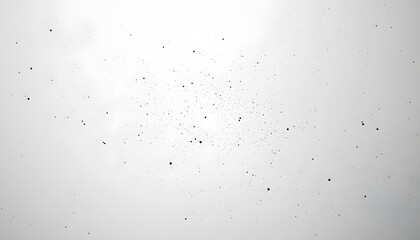 Obraz premium A mostly blank background with a small, centered design, like a tiny star or dot, emphasizing simplicity and space