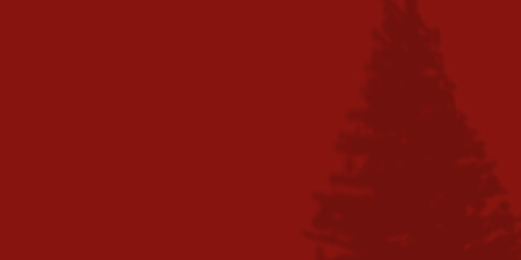 Christmas tree shadow on red background with copy space. Background minimalist concept.
