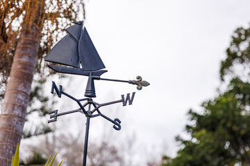 Wind Direction dial with boat on it