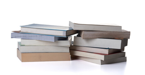 Stack of books on white background