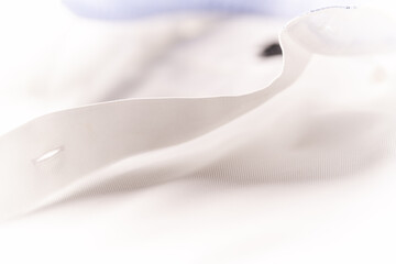Close up of white Men's shirt.
