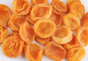 Sugar dried apricots on a white background.