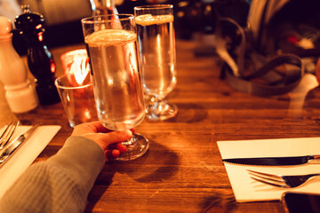 Grabbing a Glass of Lemon Water in a Restaurant