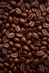 Obraz premium Layers of densely packed roasted coffee beans capturing rich brown tones 