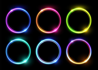 Vector set of abstract glowing circles with sparkling highlights isolated on black background.