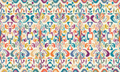 Ikat seamless pattern,geometric design,motif ethnic handmade, Ikat ethnic tribal,boho colors seamless wallpaper. for background,fabric,wrapping,clothing,wallpaper,batik,carpet,embroidery style.