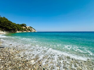 Crystal clear sea water of Lemonakia Beach, Samos island, Greece