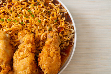 Korean instant noodles with fried chicken or Fried chicken ramyeon