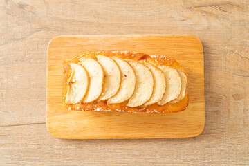 apple loaf crumbled on wood board