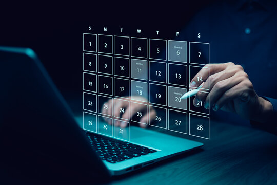 Businessman manage time for effective work. appointment reminders and meeting agenda on the calendar. Time management concept.Calendar on the virtual screen interface.