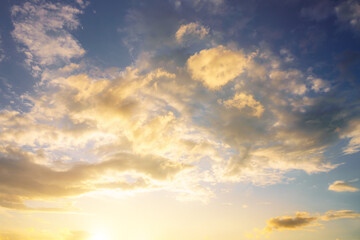 Dramatic cloudy sky at sunset or sunrise. Nature. Vintage film aesthetic.