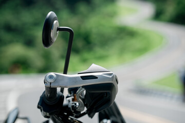 motorcycle in a sunny motorbike on the road riding.with sunset light. copyspace for your individual text.On the road.	