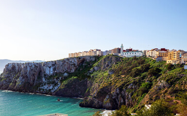 Picturesque view of buildings on a rocky cliff. Al Hoceima city. Morocco