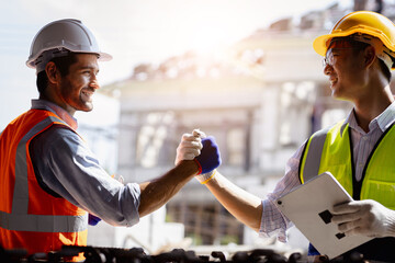 Team Construction or engineering group and worker. Teamwork and determination to succeed. Safety...