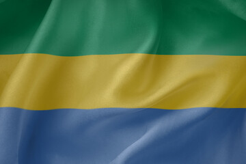 Obraz premium Gabon waving flag close up fabric texture background