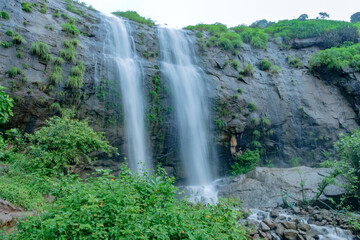 A waterfall during the monsoons near Pune India. Monsoon is the annual rainy season in India from June to September.