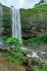 A waterfall during the monsoons near Pune India. Monsoon is the annual rainy season in India from June to September.