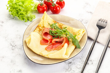 Russian pancake with salmon fish