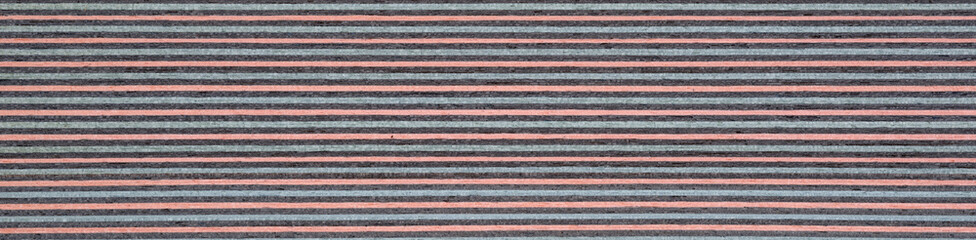 Multicolored striped veneer surface with textured detail and subtle sheen
