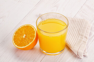 Sweet fresh orange juice in the glass