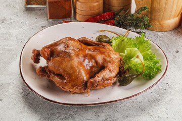 Baked small chicken with spices