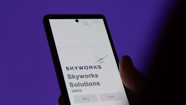 April 09th 2024 , Irvine, California. Close up on logo of Skyworks Solutions on the screen of an exchange. Skyworks Solutions price stocks, $SWKS on a device.