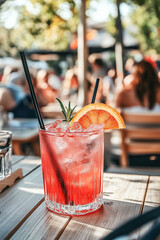 Bright Red Cocktail with Black Straw and Orange Slice on Light Wooden Table, Illuminated by Sunlight from Above - A Vibrant and Refreshing Summer Beverage Captured with Canon EOS R8