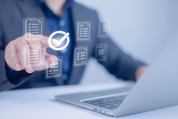 Show document management system on laptop. Managing corporate file information, document work...