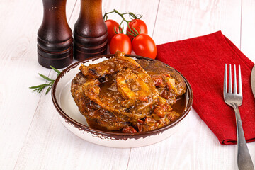 Italian cuisine - ossobuco with sauce