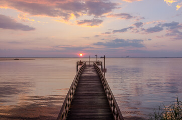 Obraz premium August sunset at Mobile Bay, Alabama