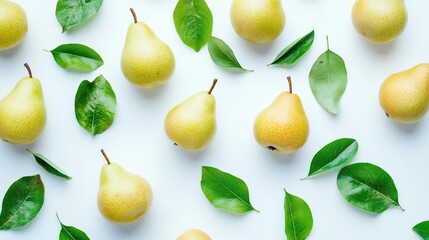 Obraz premium A flat lay of yellow pears and green leaves on a white background.