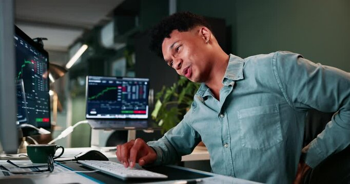 Office, night and businessman with back pain for bad posture, overtime and burnout at trading company. Business, data analyst and computer with graphs for cryptocurrency, investment and work injury
