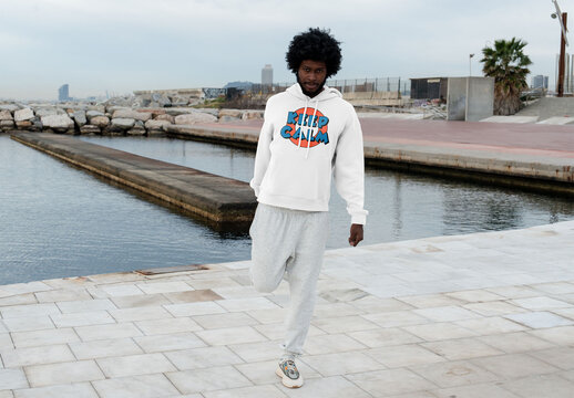 Mockup Of Man In Customizable Hoodie Stretching