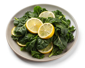 Dark leafy greens arranged on a plate with lemon slices, isolated on white