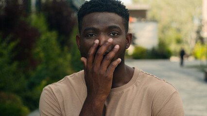 Emotional African American man amazed surprised face biracial ethnic wonder shocked stunned guy...