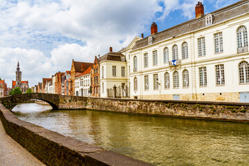 Fototapeta premium Bruges canals. The Spiegelrei Canal with its colourful historic townhouses. Bruges, Belgium, Europe