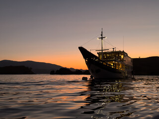 Boat anchored at sea at Sunset, Gili Lawa Darat, East Nusa Tenggara, Indonesia