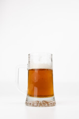 Frosty Beer Mug Filled with Toasted Beer on White Background