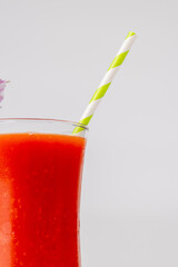 Close-Up of Bloody Mary and Green Straw on White Horizontal Background