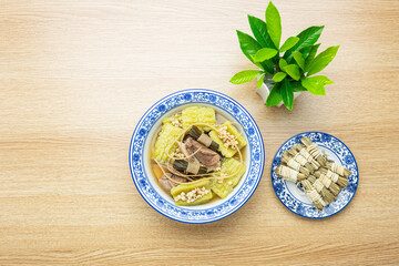 Guangdong traditional soup - rush, barley, bitter melon and pork bone soup