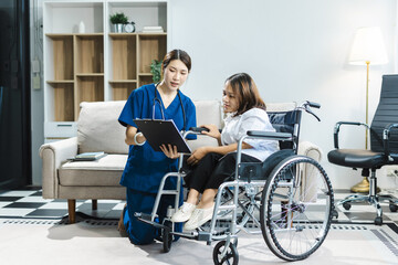 Friendly nurse doctor offering patient support during recovery. A loving caregiver taking care of her patient and showing kindness while doing a checkup in living home.